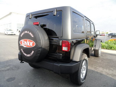 jeep wrangler unlimited 2012 black suv sport gasoline 6 cylinders 4 wheel drive automatic 60915