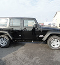 jeep wrangler unlimited 2012 black suv sport gasoline 6 cylinders 4 wheel drive automatic 60915