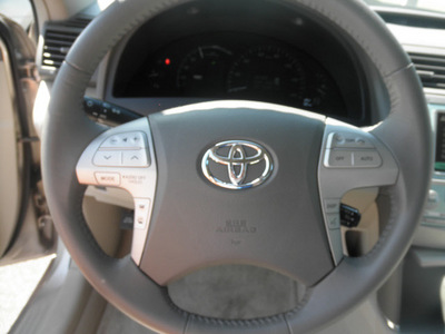 toyota camry hybrid 2007 gold sedan camry hybrid 4 cylinders front wheel drive automatic 34788