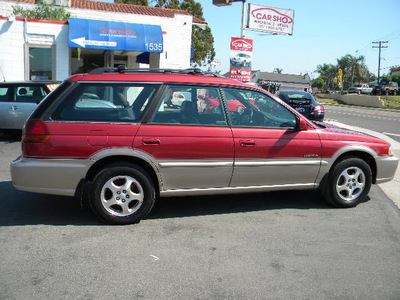 subaru legacy 1998 red wagon outback limited gasoline 4 cylinders all whee drive 5 speed manual 92882