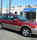 subaru legacy 1998 red wagon outback limited gasoline 4 cylinders all whee drive 5 speed manual 92882