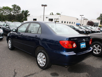 toyota corolla 2004 blue sedan le gasoline 4 cylinders front wheel drive automatic with overdrive 07702