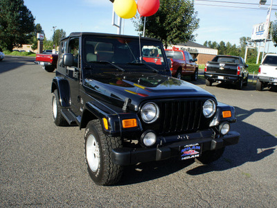 jeep wrangler 2004 black suv sahara gasoline 6 cylinders 4 wheel drive automatic with overdrive 98371