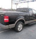 ford f 150 2004 black pickup truck lariat gasoline 8 cylinders rear wheel drive automatic with overdrive 32401