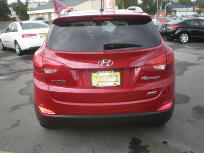 hyundai tucson 2011 red gasoline 4 cylinders all whee drive automatic 13502
