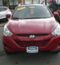 hyundai tucson 2011 red gasoline 4 cylinders all whee drive automatic 13502