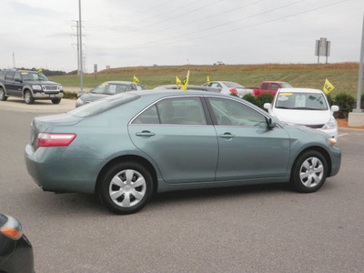toyota camry 2009 green sedan le gasoline 4 cylinders front wheel drive automatic 56001