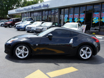 nissan 370z 2010 black coupe gasoline 6 cylinders rear wheel drive automatic 33021