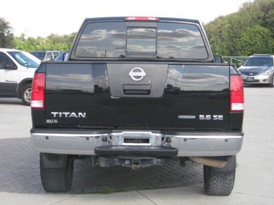 nissan titan 2009 black se flex fuel 8 cylinders 4 wheel drive automatic 33884