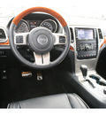 jeep grand cherokee 2011 black suv overland gasoline 8 cylinders 4 wheel drive automatic 99352