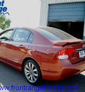honda civic 2009 redline orange sedan si gasoline 4 cylinders front wheel drive 6 speed manual 80910