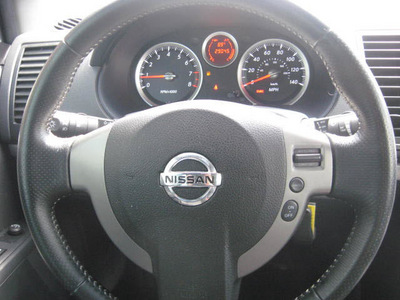 nissan sentra 2010 black sedan se r spec v gasoline 4 cylinders front wheel drive 6 speed manual 33884