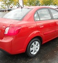 kia rio 2010 red sedan gasoline 4 cylinders front wheel drive not specified 43228