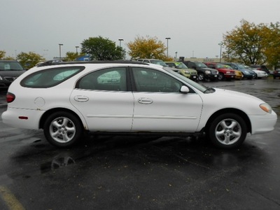 ford taurus 2001 white wagon gasoline 6 cylinders front wheel drive 4 speed automatic 43228