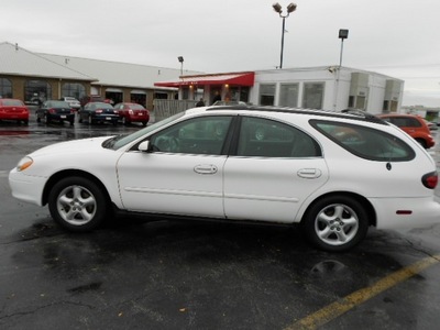 ford taurus 2001 white wagon gasoline 6 cylinders front wheel drive 4 speed automatic 43228