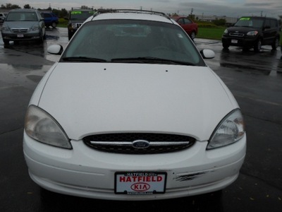 ford taurus 2001 white wagon gasoline 6 cylinders front wheel drive 4 speed automatic 43228