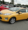 ford fiesta 2012 yellow sedan sel gasoline 4 cylinders front wheel drive automatic 98032