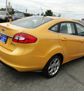 ford fiesta 2012 yellow sedan sel gasoline 4 cylinders front wheel drive automatic 98032