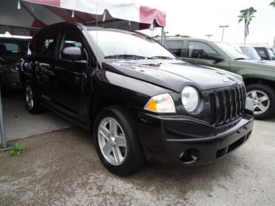 jeep compass 2010 black suv sport gasoline 4 cylinders 4 wheel drive automatic 33157
