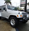 jeep wrangler 2005 silver suv unlimited gasoline 6 cylinders 4 wheel drive automatic 33157