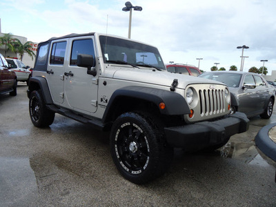 jeep wrangler unlimited 2007 silver suv x gasoline 6 cylinders rear wheel drive 6 speed manual 33157