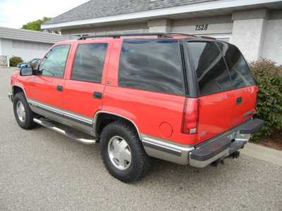chevrolet tahoe 1999 red suv ls 4wd gasoline v8 4 wheel drive automatic 55016