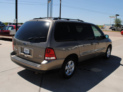 ford freestar 2005 tan van ses gasoline 6 cylinders front wheel drive automatic 76087