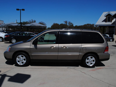 ford freestar 2005 tan van ses gasoline 6 cylinders front wheel drive automatic 76087