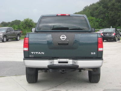 nissan titan 2006 green flex fuel 8 cylinders 4 wheel drive automatic 33884