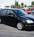 volkswagen jetta 2010 black sedan limited edition gasoline 5 cylinders front wheel drive automatic 33021