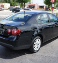 volkswagen jetta 2010 black sedan limited edition gasoline 5 cylinders front wheel drive automatic 33021