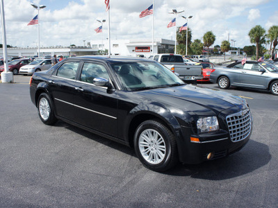 chrysler 300 2010 black sedan touring gasoline 6 cylinders rear wheel drive automatic 33021