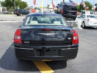 chrysler 300 2010 black sedan touring gasoline 6 cylinders rear wheel drive automatic 33021