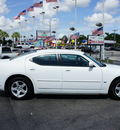 dodge charger 2010 white sedan sxt gasoline 6 cylinders rear wheel drive automatic 33021