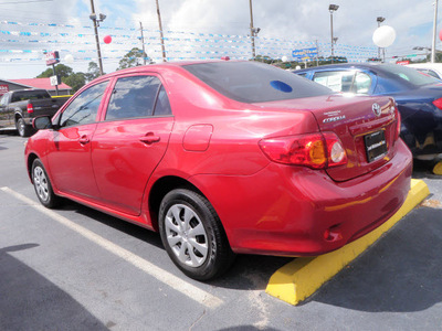 toyota corolla 2009 red sedan le gasoline 4 cylinders front wheel drive automatic 32401
