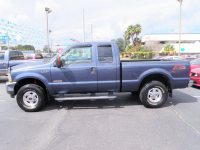 ford f 250 super duty 2004 blue lariat diesel 8 cylinders 4 wheel drive automatic with overdrive 32401