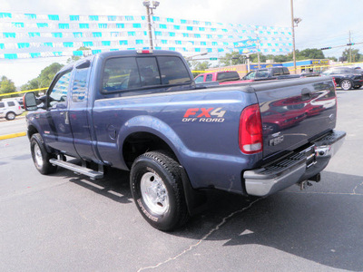 ford f 250 super duty 2004 blue lariat diesel 8 cylinders 4 wheel drive automatic with overdrive 32401