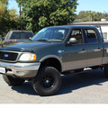 ford f 150 2002 dk  green supercrew 4x4 king ranch gasoline 8 cylinders 4 wheel drive automatic 95678