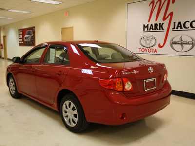 toyota corolla 2010 red sedan le gasoline 4 cylinders front wheel drive automatic 27707