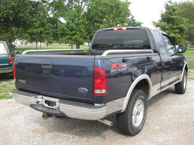 ford f 150 2003 blue lariat gasoline 8 cylinders sohc 4 wheel drive automatic with overdrive 62863