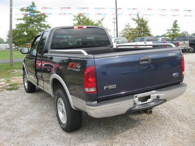 ford f 150 2003 blue lariat gasoline 8 cylinders sohc 4 wheel drive automatic with overdrive 62863