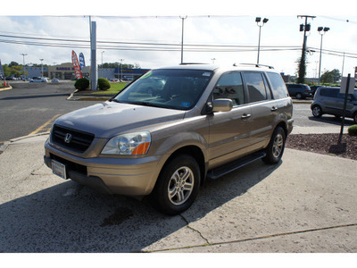 honda pilot 2004 sandstone suv ex l gasoline 6 cylinders all whee drive 5 speed automatic 07724