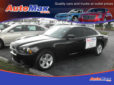 dodge charger 2011 black sedan gasoline 6 cylinders rear wheel drive automatic 34474