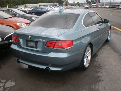 bmw 335xi 2008 blue coupe gasoline 6 cylinders all whee drive 6 speed manual 13502