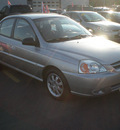 kia rio 2004 silver sedan gasoline 4 cylinders front wheel drive automatic with overdrive 13502