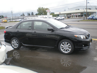 toyota corolla 2009 black sedan gasoline 4 cylinders front wheel drive automatic 13502