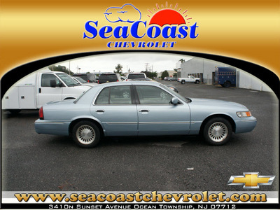 mercury grand marquis 2002 light ice blue sedan ls premium gasoline 8 cylinders rear wheel drive automatic with overdrive 07712