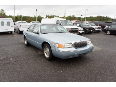 mercury grand marquis 2002 light ice blue sedan ls premium gasoline 8 cylinders rear wheel drive automatic with overdrive 07712