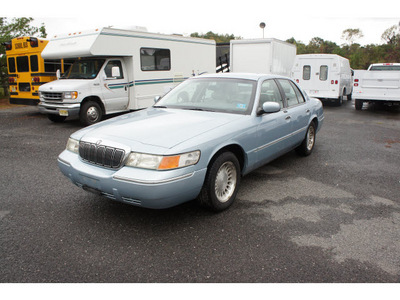 mercury grand marquis 2002 light ice blue sedan ls premium gasoline 8 cylinders rear wheel drive automatic with overdrive 07712