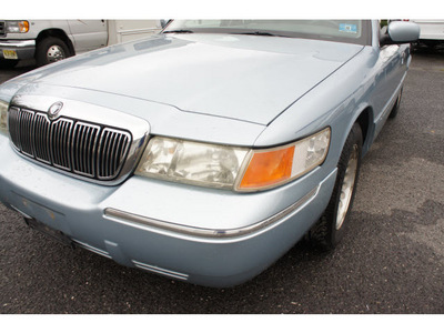 mercury grand marquis 2002 light ice blue sedan ls premium gasoline 8 cylinders rear wheel drive automatic with overdrive 07712